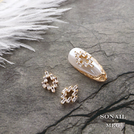 SONAIL×MEG cross hole amulet motif crystal
